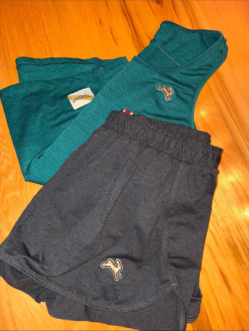 Tracksmith size small green top and grey shorts bundle